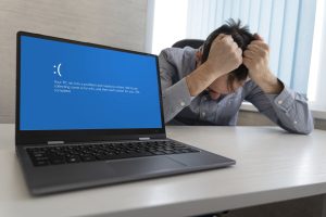Reactive IT challenges causing business disruption – employee frustrated by system failure